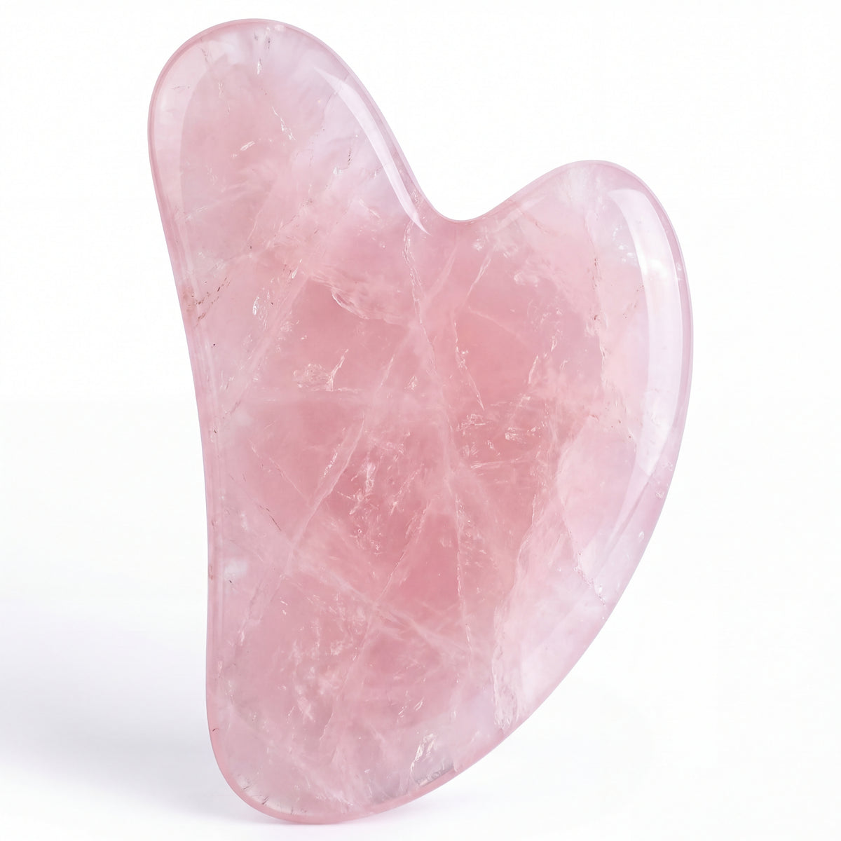Casida wellness set includes a heart-shaped rose quartz gua sha tool with smooth, polished surfaces.