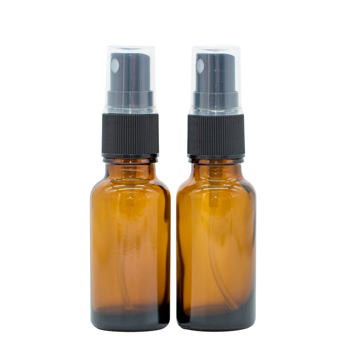 Two 20 ml brown glass spray bottles with black spray heads, designed for essential oils, displayed side by side.