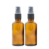 Brown glass spray bottles, 50 ml each, with black spray tops, sold as a set of two for essential oils.