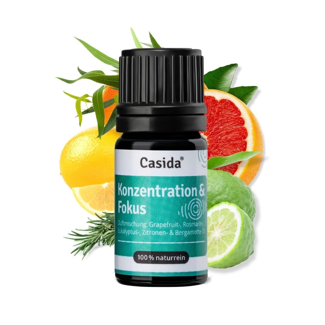 Casida Konzentration & Fokus essential oil blend in a 5 ml bottle, featuring citrus fruits like grapefruit and lemon.