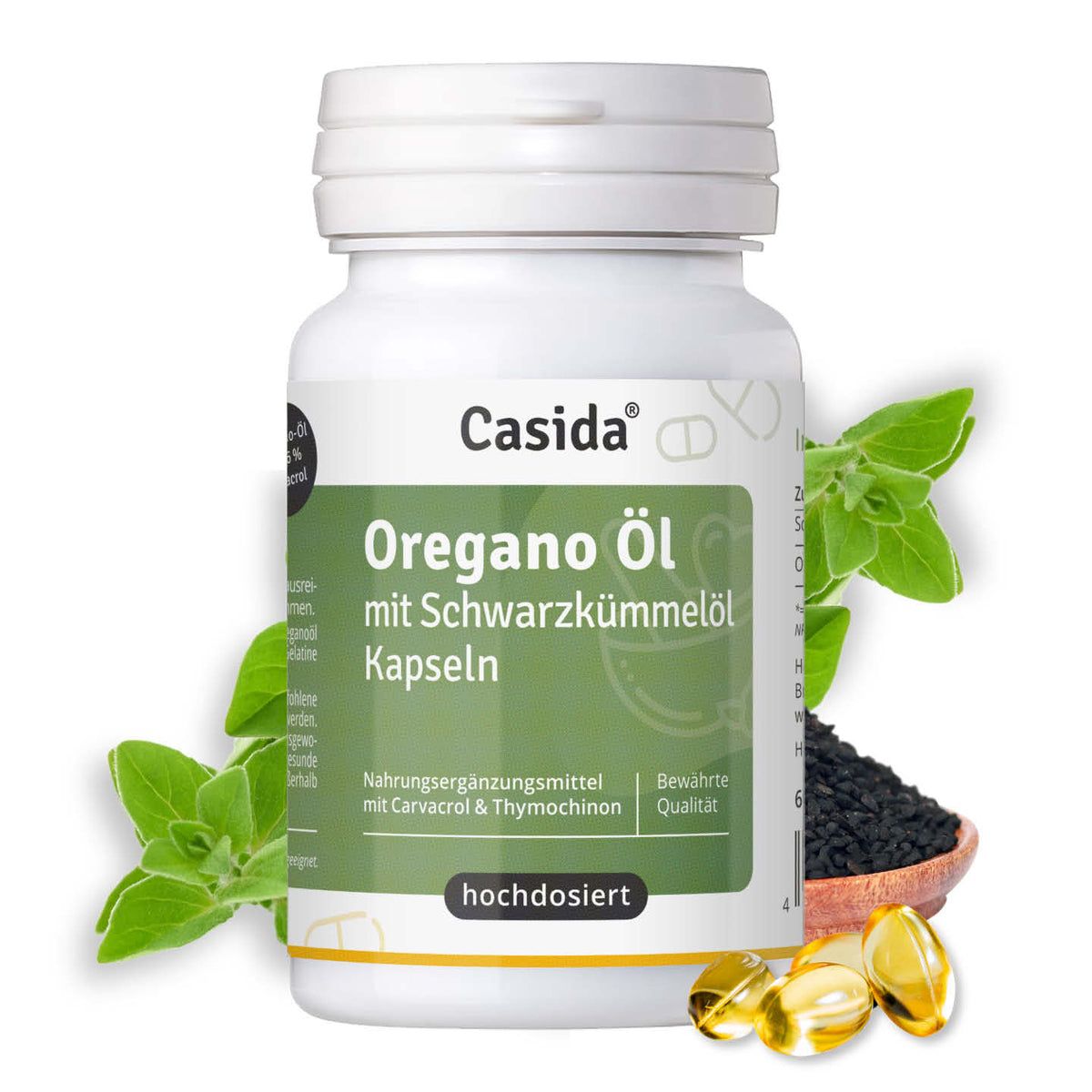 Casida Oregano-Öl mit Schwarzkümmelöl Kapseln neben Oreganoblättern, Samen und goldgelben Kapseln