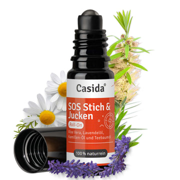 Casida SOS Roll-On Stich & Jucken with a black applicator, featuring a red label and surrounded by lavender and chamomile ...