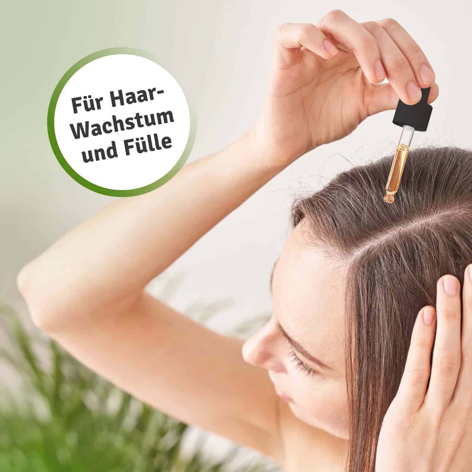 Casida Rosmarin hair treatment set with a woman applying oil to her scalp using a dropper.