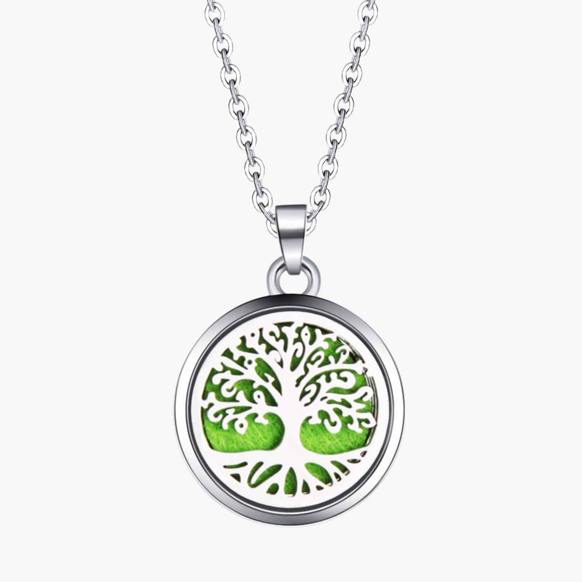Silver tree of life pendant necklace with green accents on a chain.