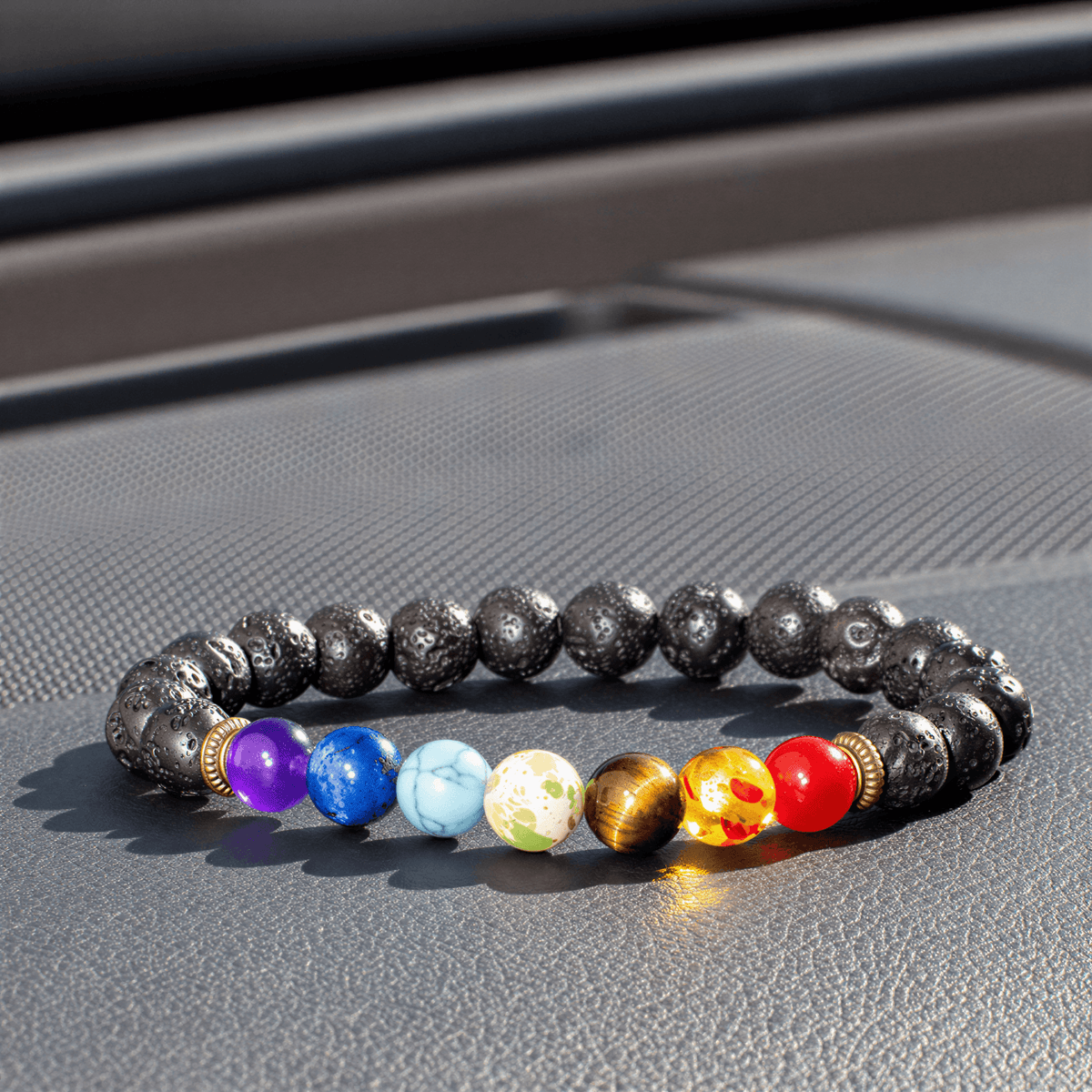 Chakra bead bracelet for essential oils with 8 mm natural stone beads in various colors and black lava stone.