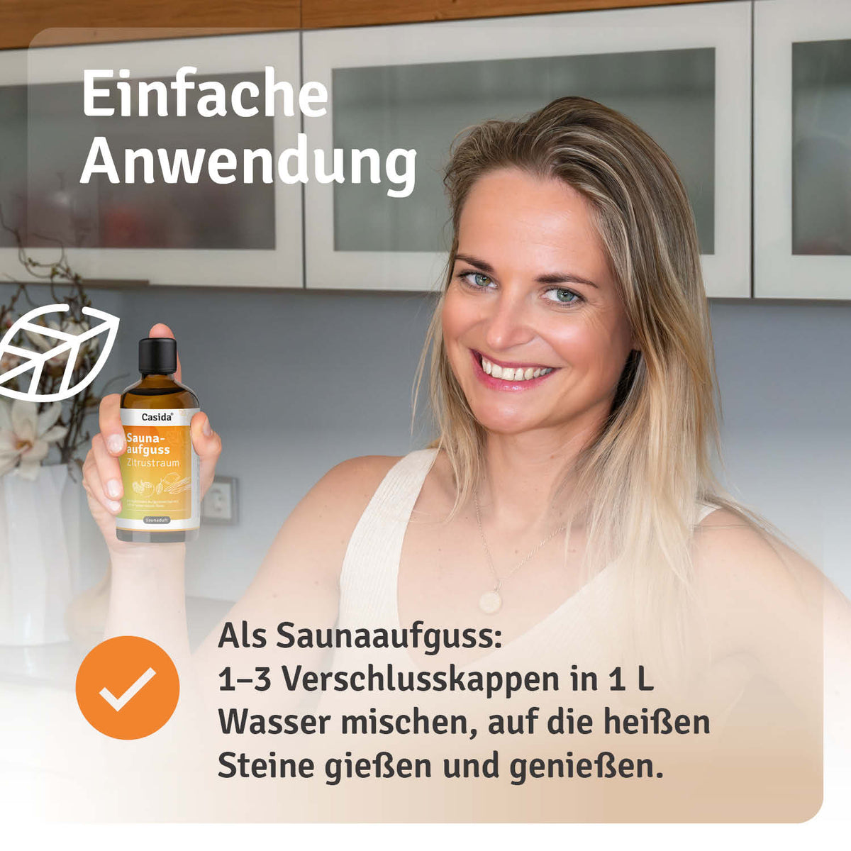 Saunaaufguss Zitrustraum oil bottle held by a smiling woman, with instructions in the background.