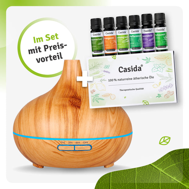 Aroma diffuser in wood design with six essential oil bottles and a product card displayed together.